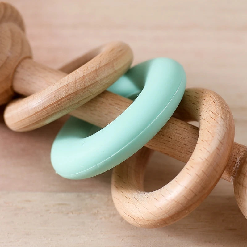 Sonaglio in Legno Primi Passi™ con Anello Silicone