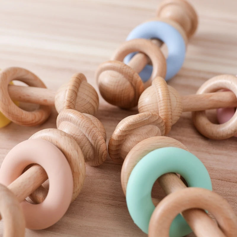 Sonaglio in Legno Primi Passi™ con Anello Silicone